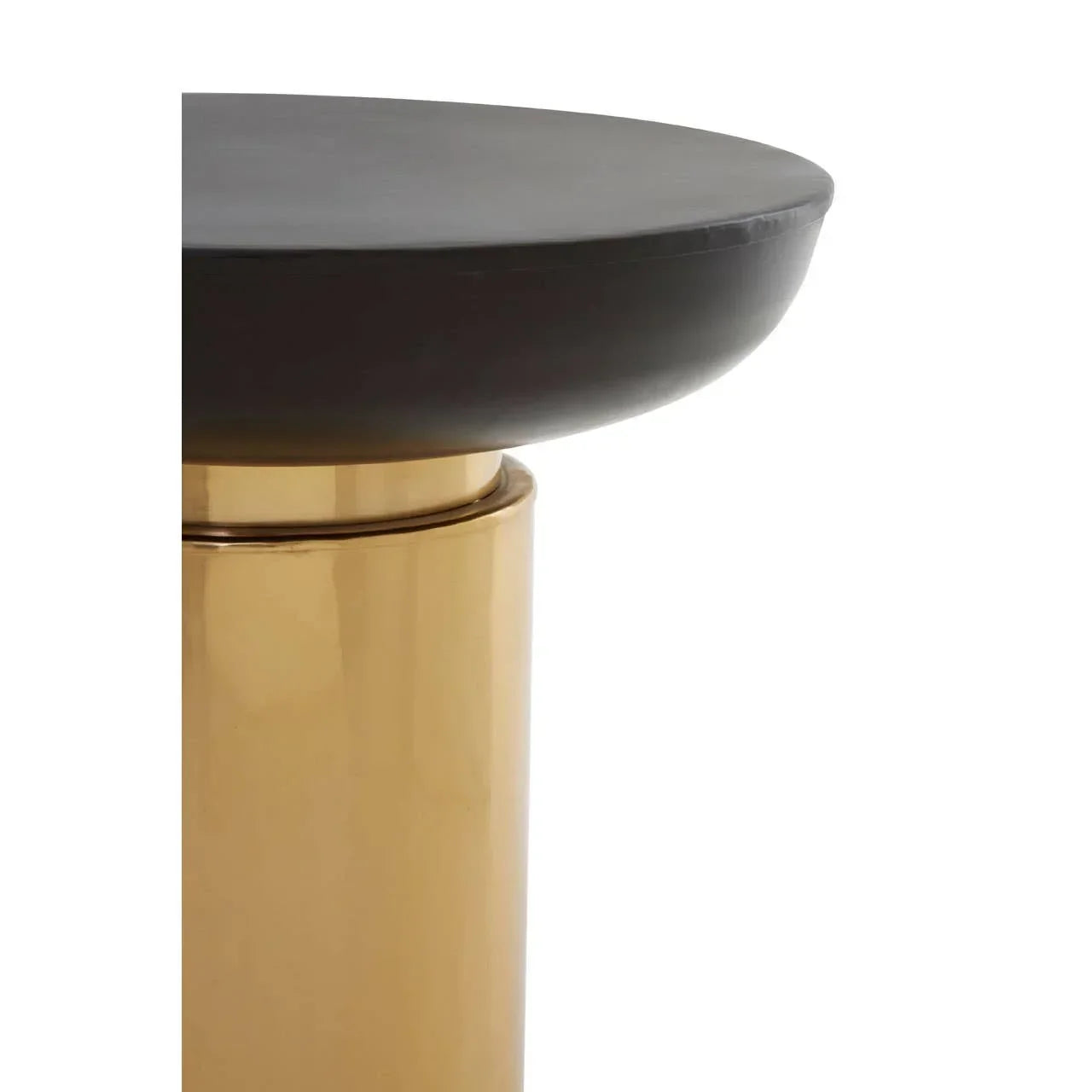 Black and gold accent table with round top and cylindrical base close-up view