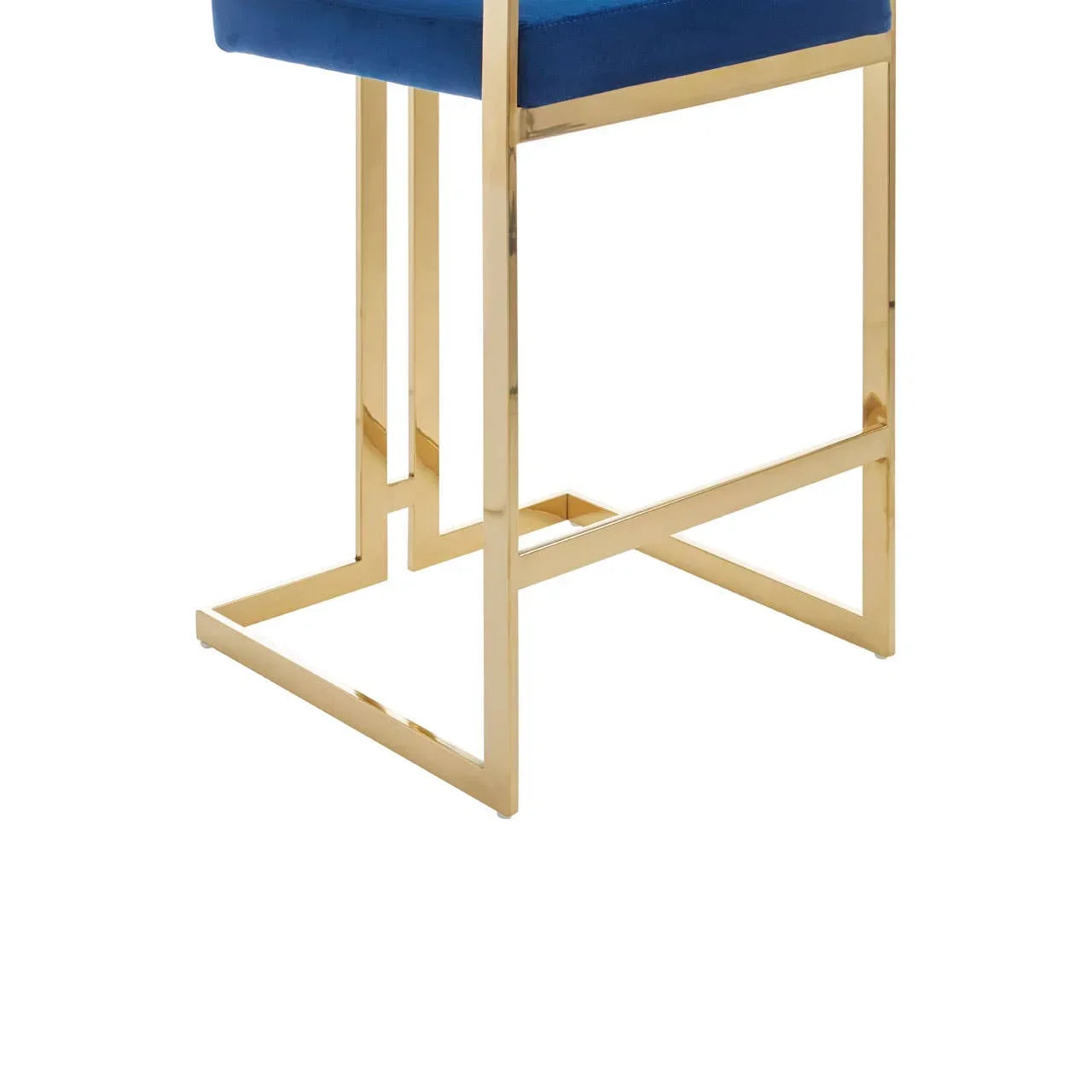 Blue velvet dining chair with gold metal frame and modern geometric base