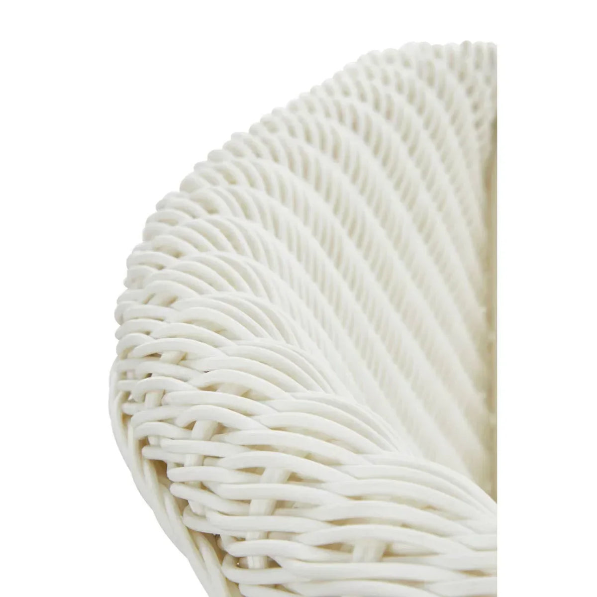 Close-up of white rattan garden furniture frame detail