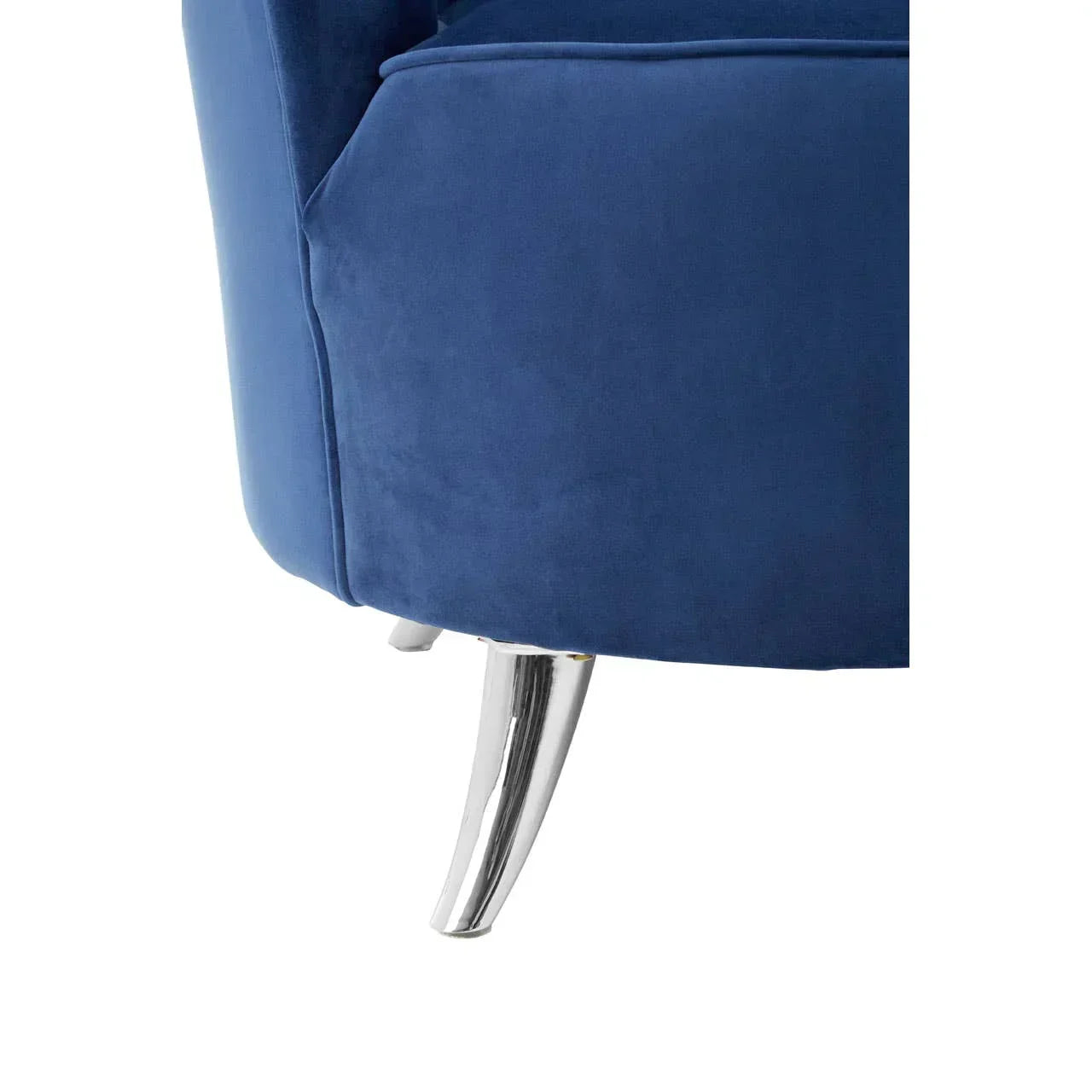Blue velvet armchair corner with chrome metal leg close-up