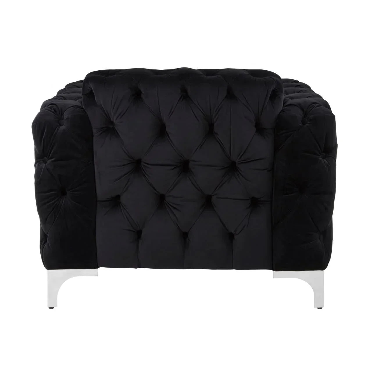 Black velvet Chesterfield armchair with deep buttoned upholstery and chrome legs, front view
