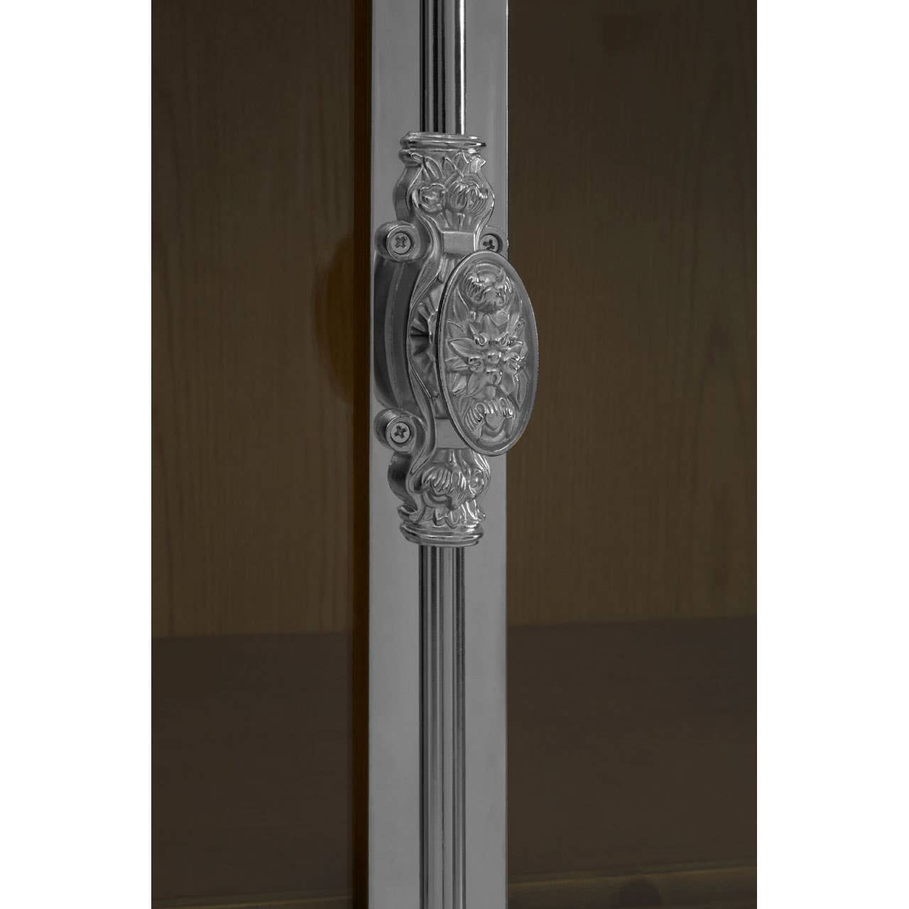 Close-up view of the ornate handle on the Richmond White Washed Pine Wood 2 Door Cabinet, showcasing intricate detailing and a polished finish against a dark interior background