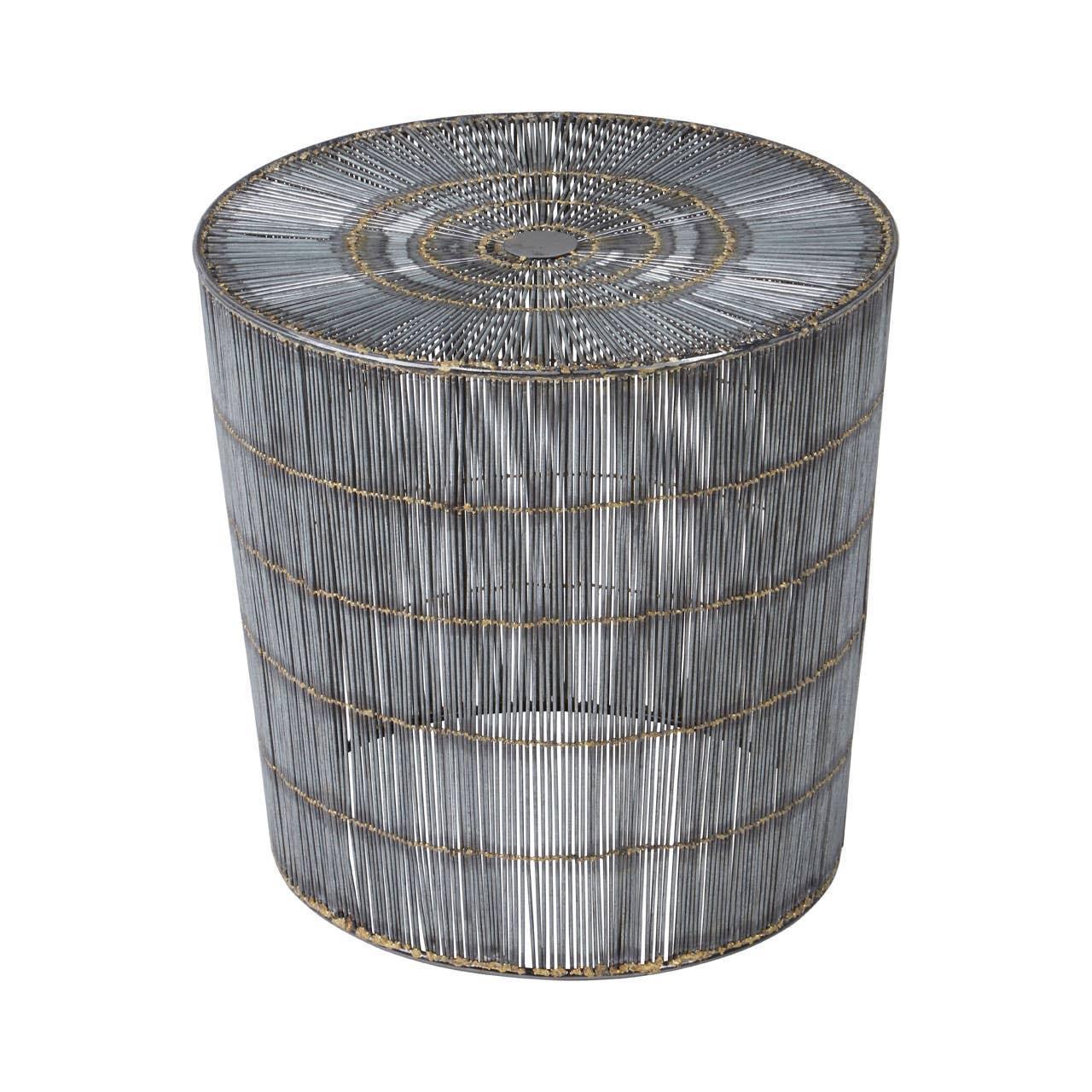 Round metal side table with wire frame design and brushed silver finish
