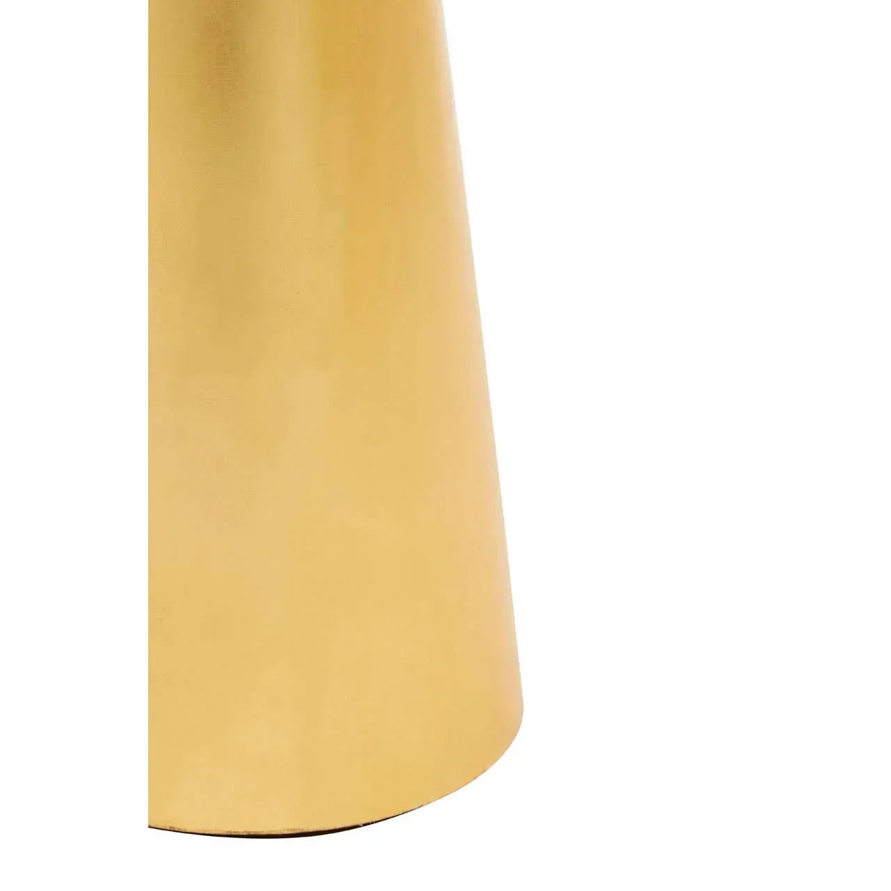 Close view of gold metal furniture leg with smooth, cylindrical design