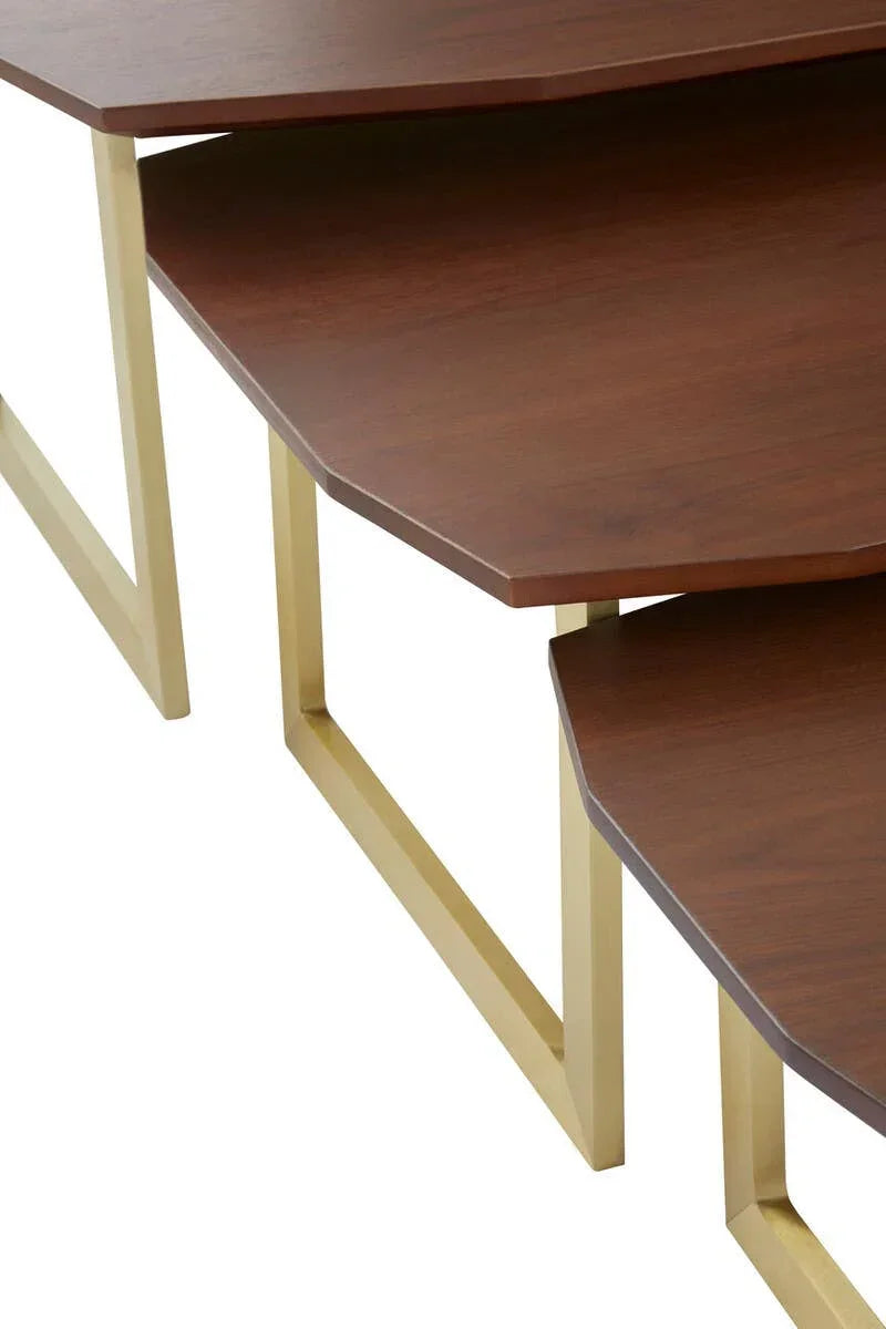 Set of geometric wooden nesting tables with gold metal legs, close side angle view