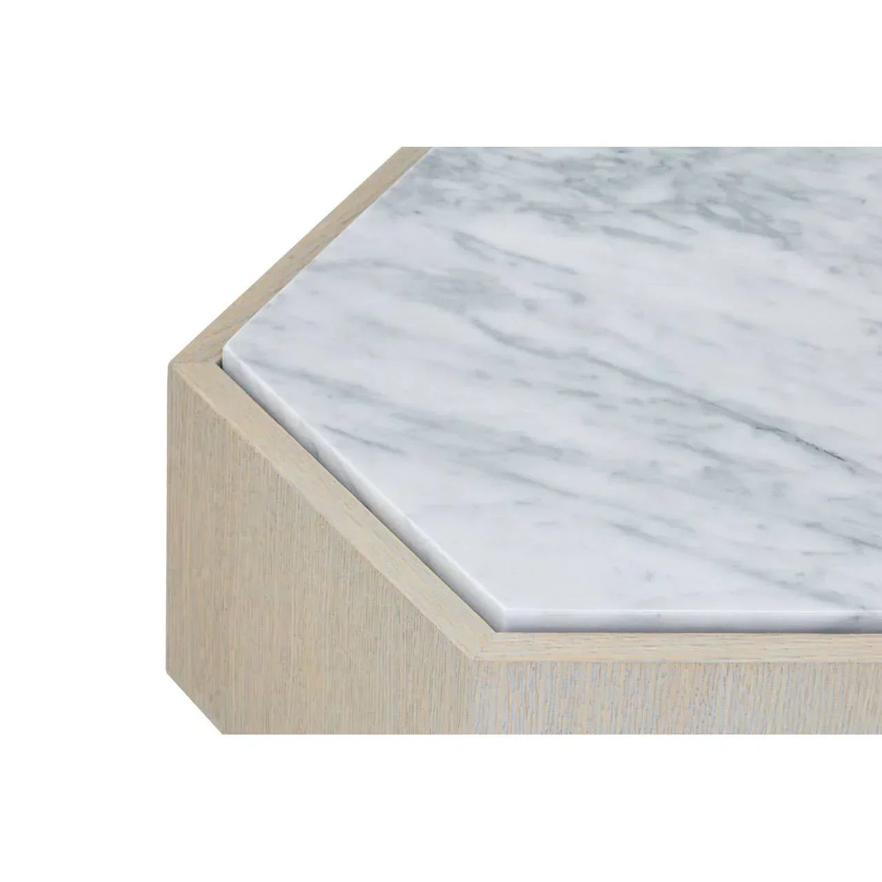 Hexagonal marble coffee table top with light wood frame, close-up corner detail