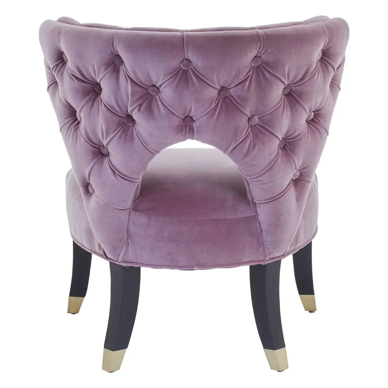 Mauve velvet accent chair with button-tufted back and gold-tipped black legs, rear view