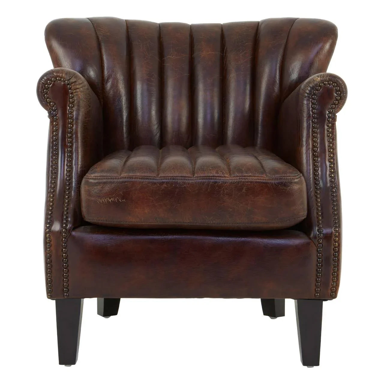 Brown leather armchair with fluted backrest and nailhead trim on wooden legs