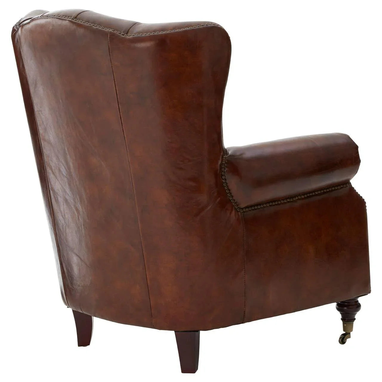 Back view of brown leather armchair with wooden legs and brass caster front wheel
