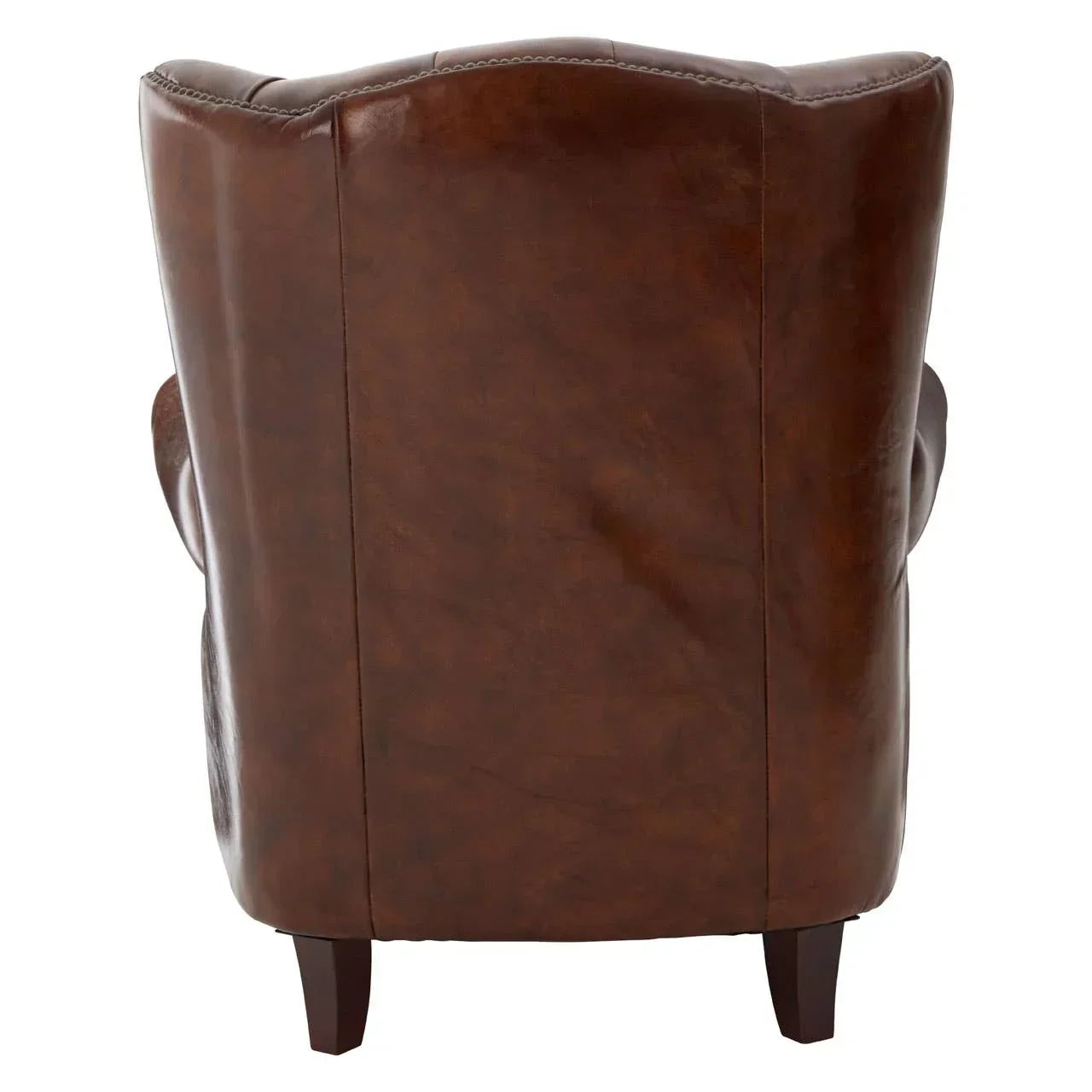 Rear view of brown leather armchair with curved back and wooden legs