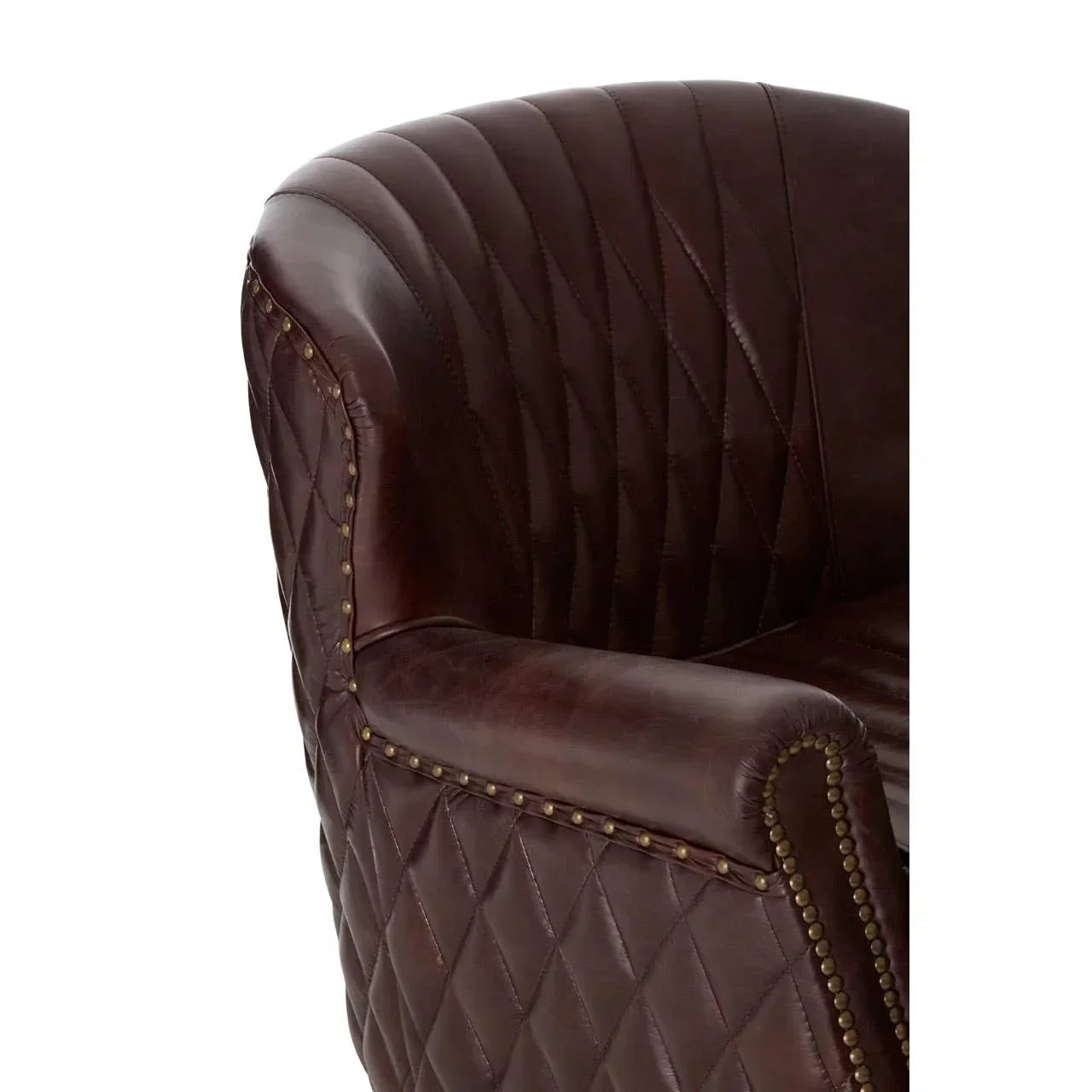 Brown leather armchair with diamond stitched upholstery and brass stud detailing