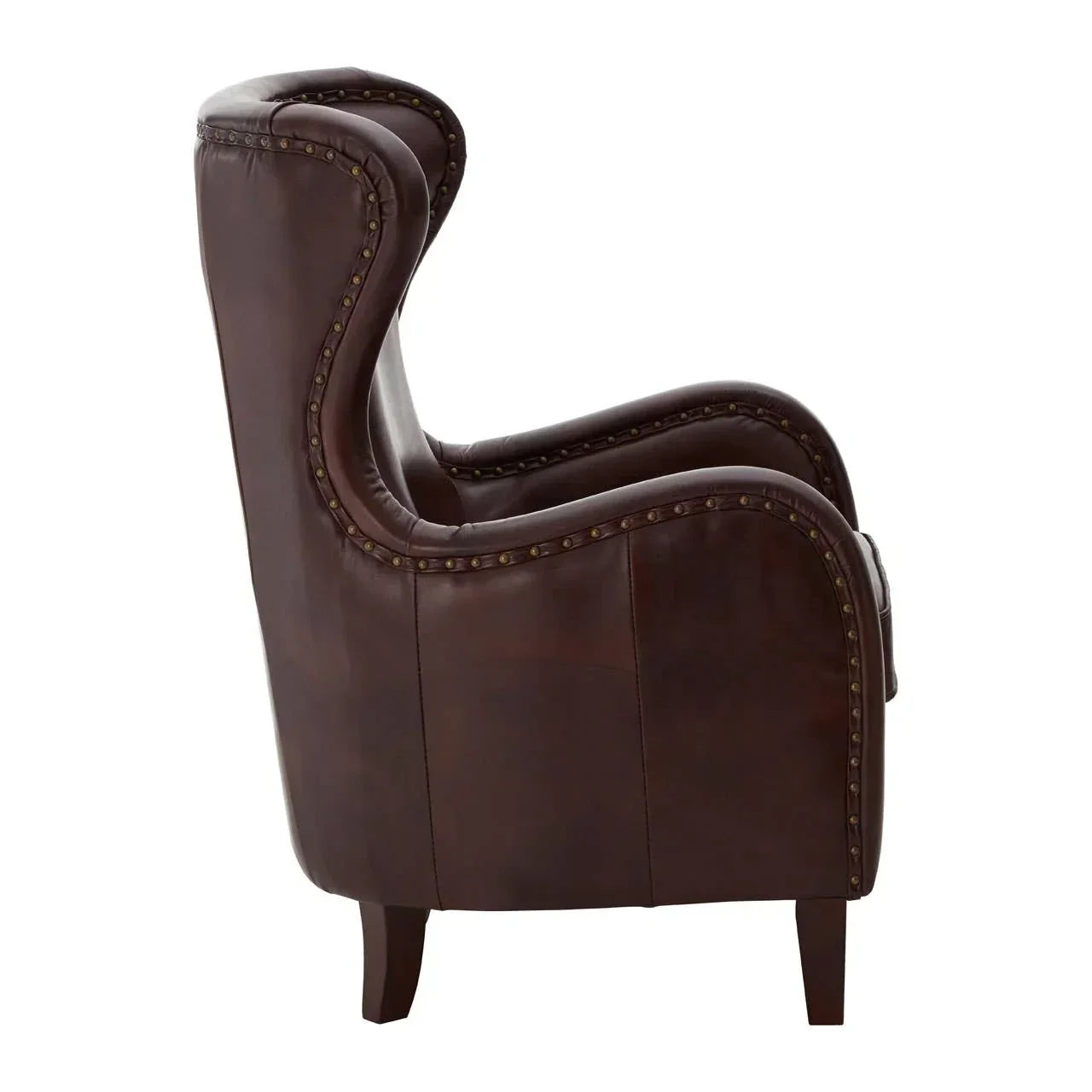 Side view of brown leather armchair with studded detailing and curved armrests