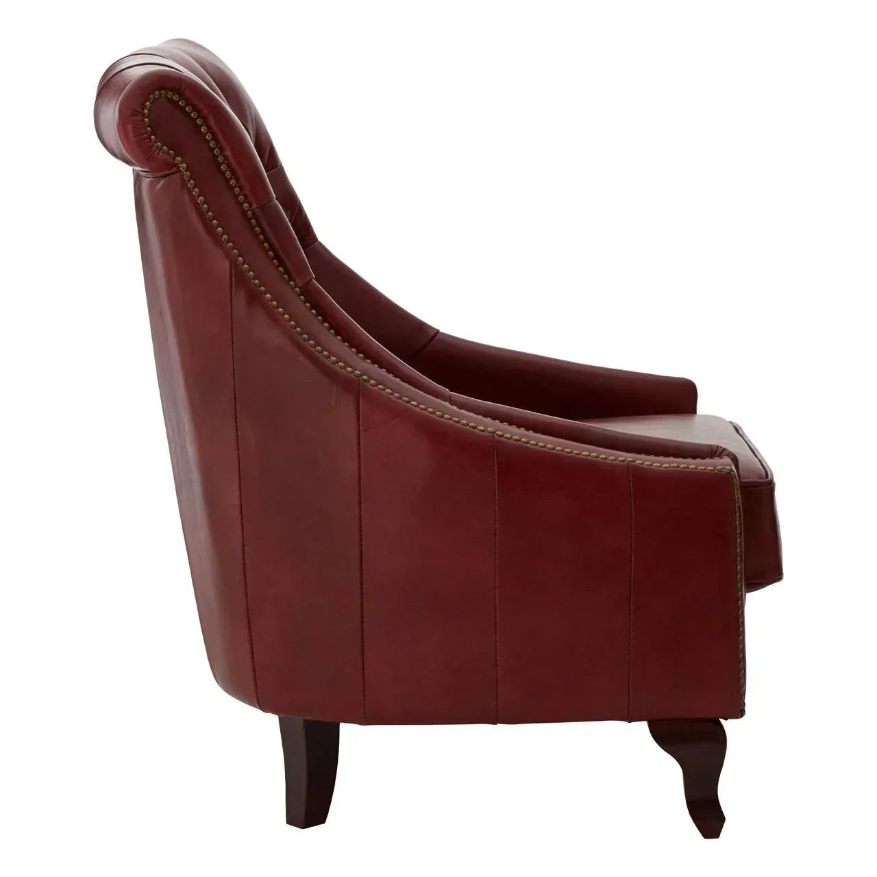 Side view of a red leather armchair with studded trim and dark wooden legs