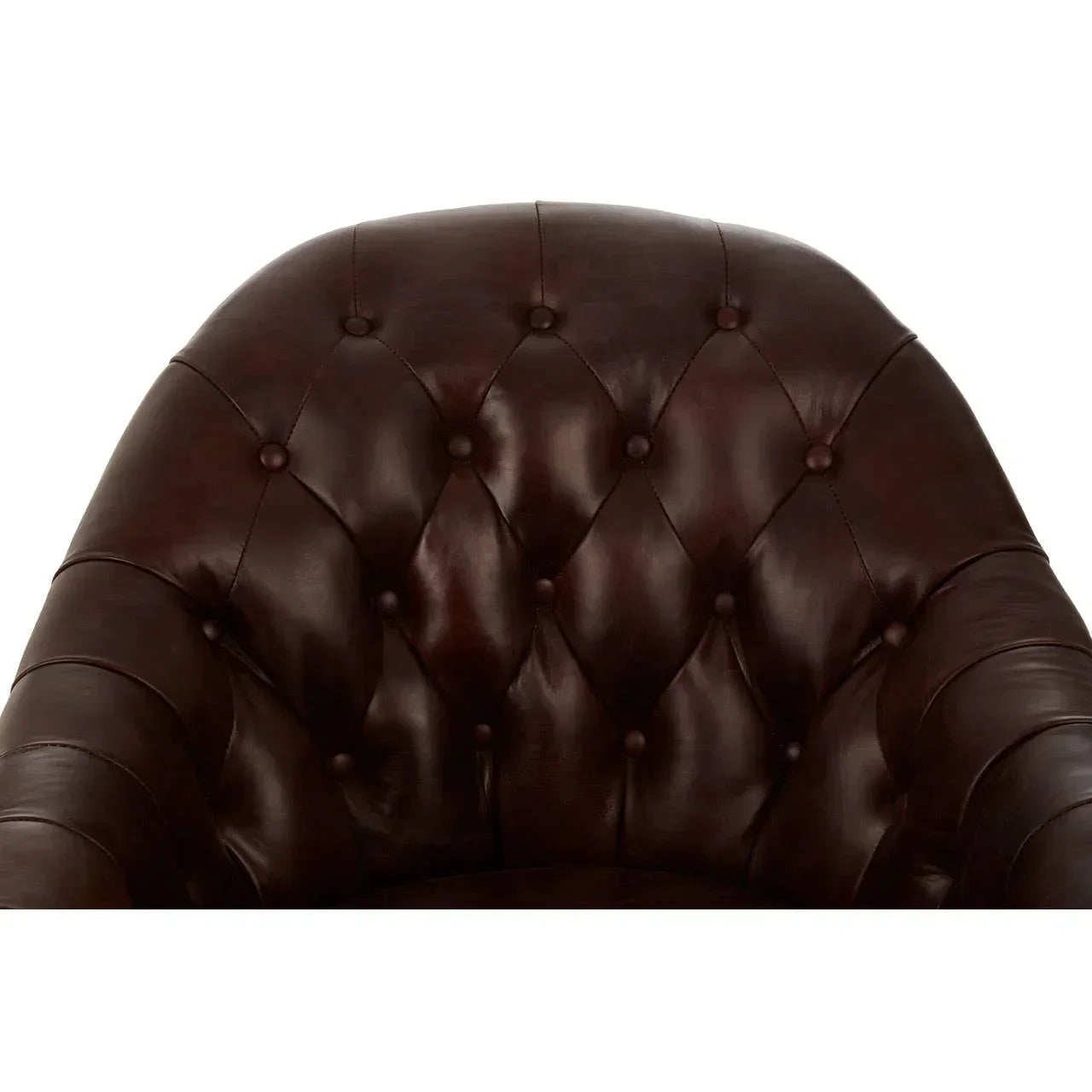 Close-up of dark brown leather armchair with deep button tufted backrest
