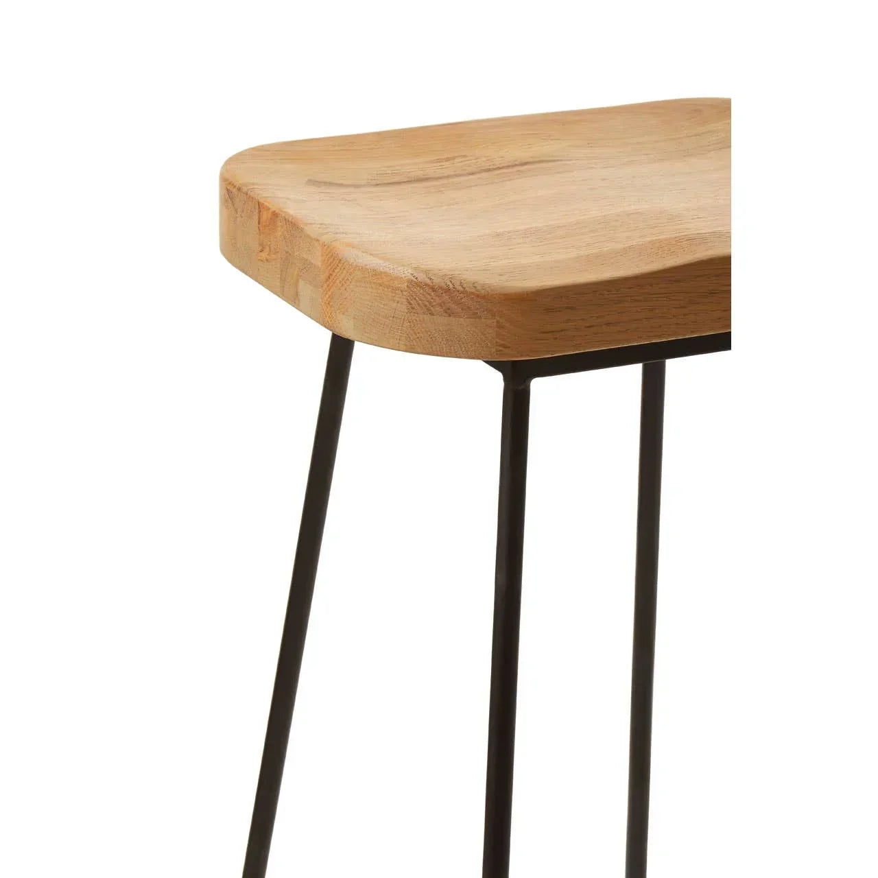 Close-up of wooden stool seat with black metal hairpin legs