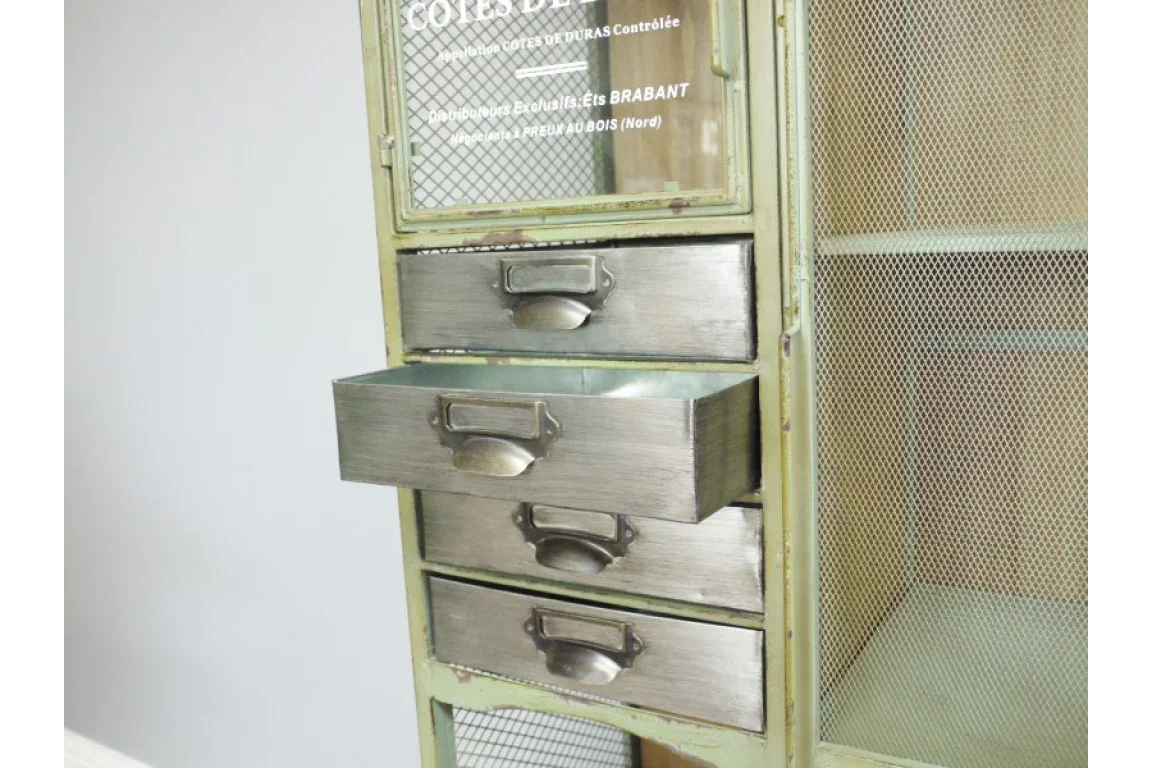 Industrial metal storage cabinet with mesh door and open drawer, vintage finish
