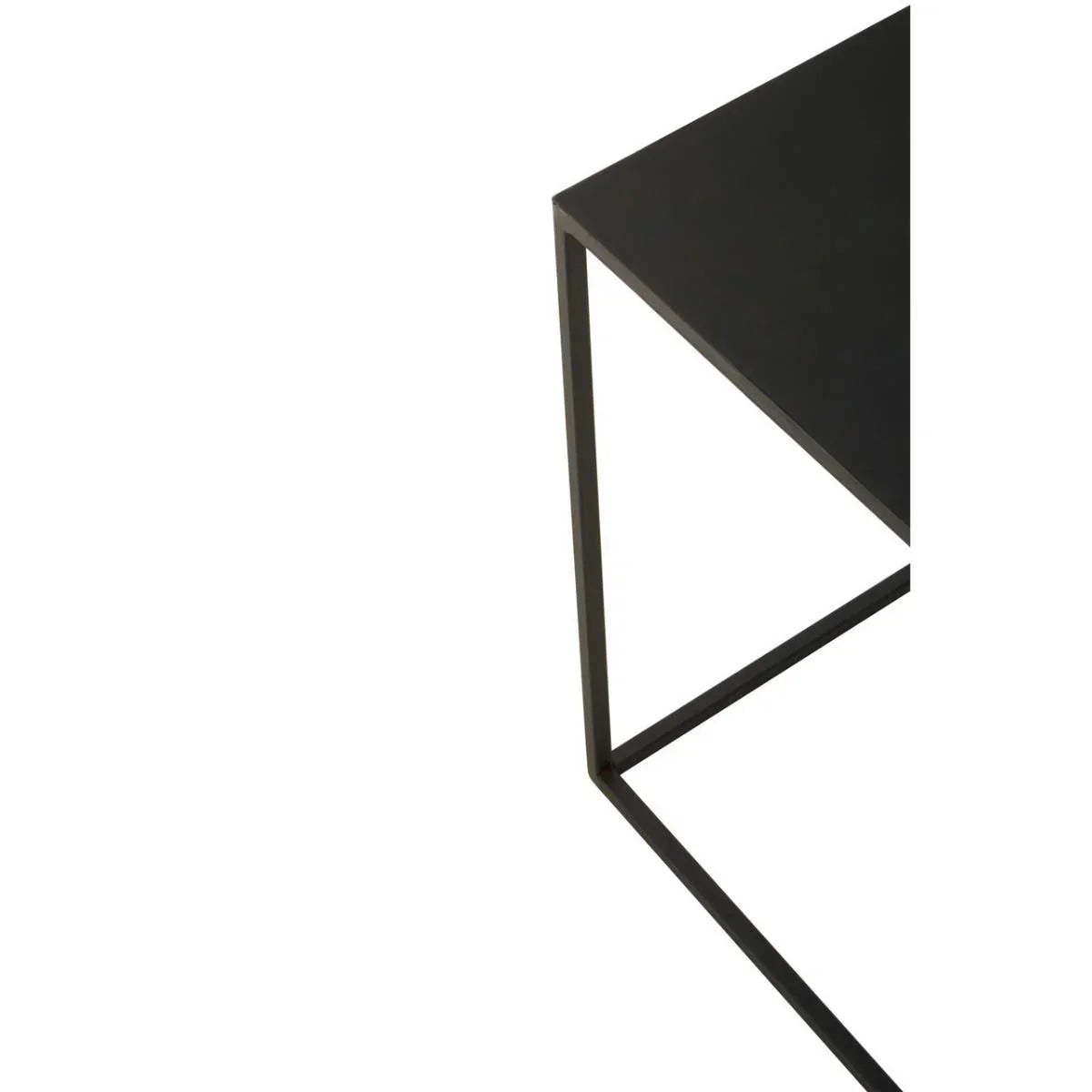 Black metal side table with slim frame, close-up of corner and legs