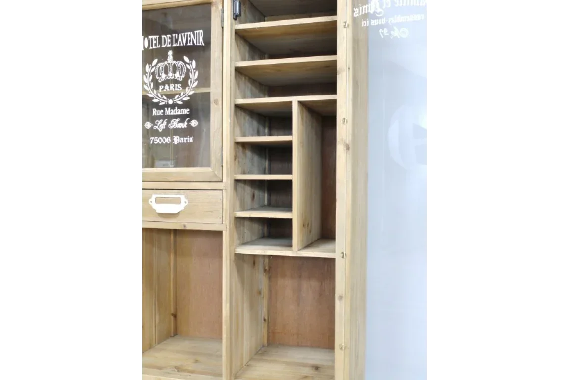 Wooden shelving unit with open compartments and glass cabinet door featuring Paris design