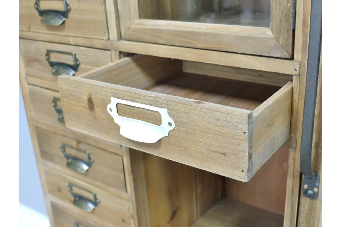 Rustic wooden chest of drawers with metal handles shown with one drawer open
