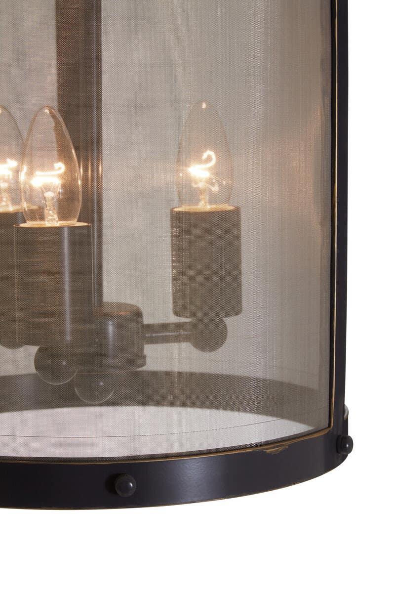 Close-up of black mesh drum pendant light with exposed bulbs