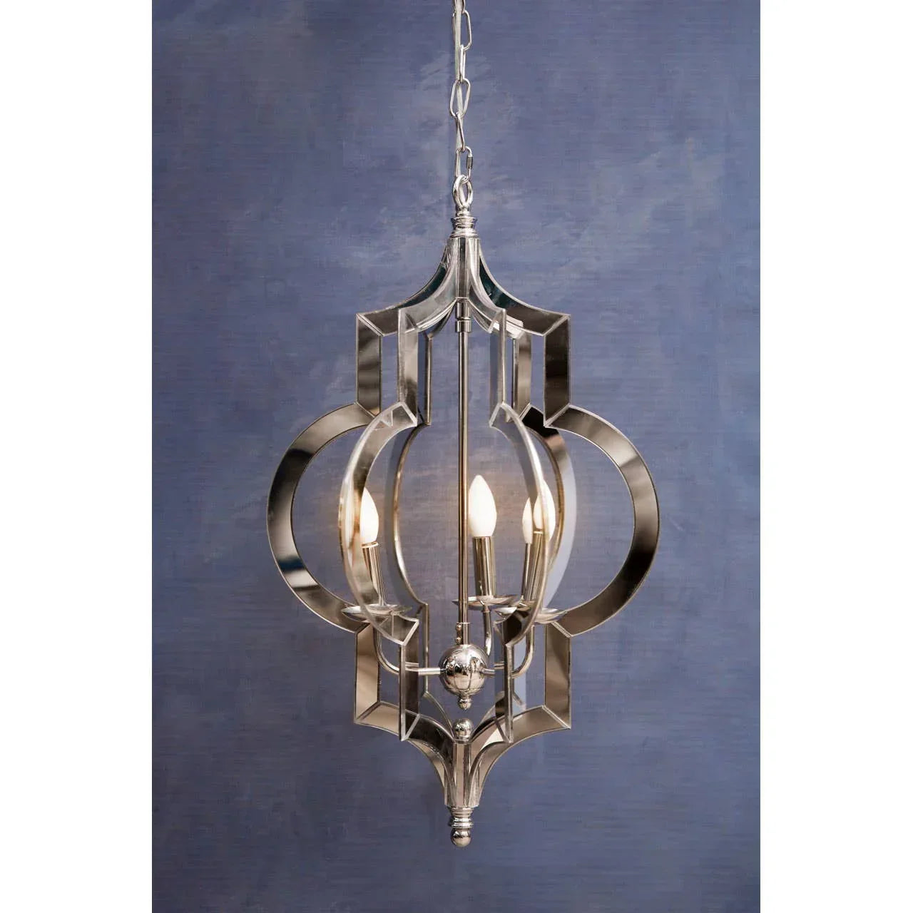 Polished metal pendant light with geometric frame and three candle-style bulbs