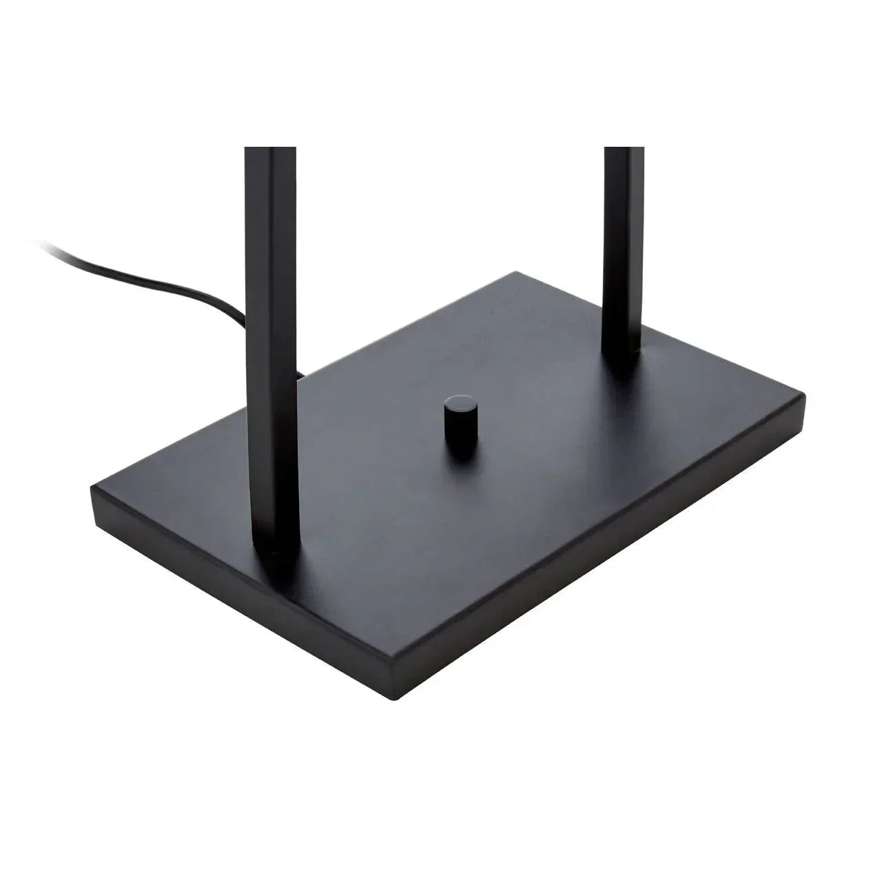 Black metal lamp base with push button switch and power cord, close-up view
