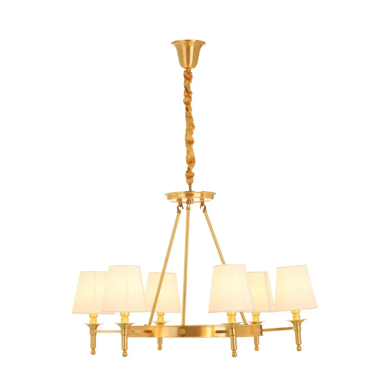 Gold chandelier with six cream fabric lampshades and circular metal frame hanging from ceiling