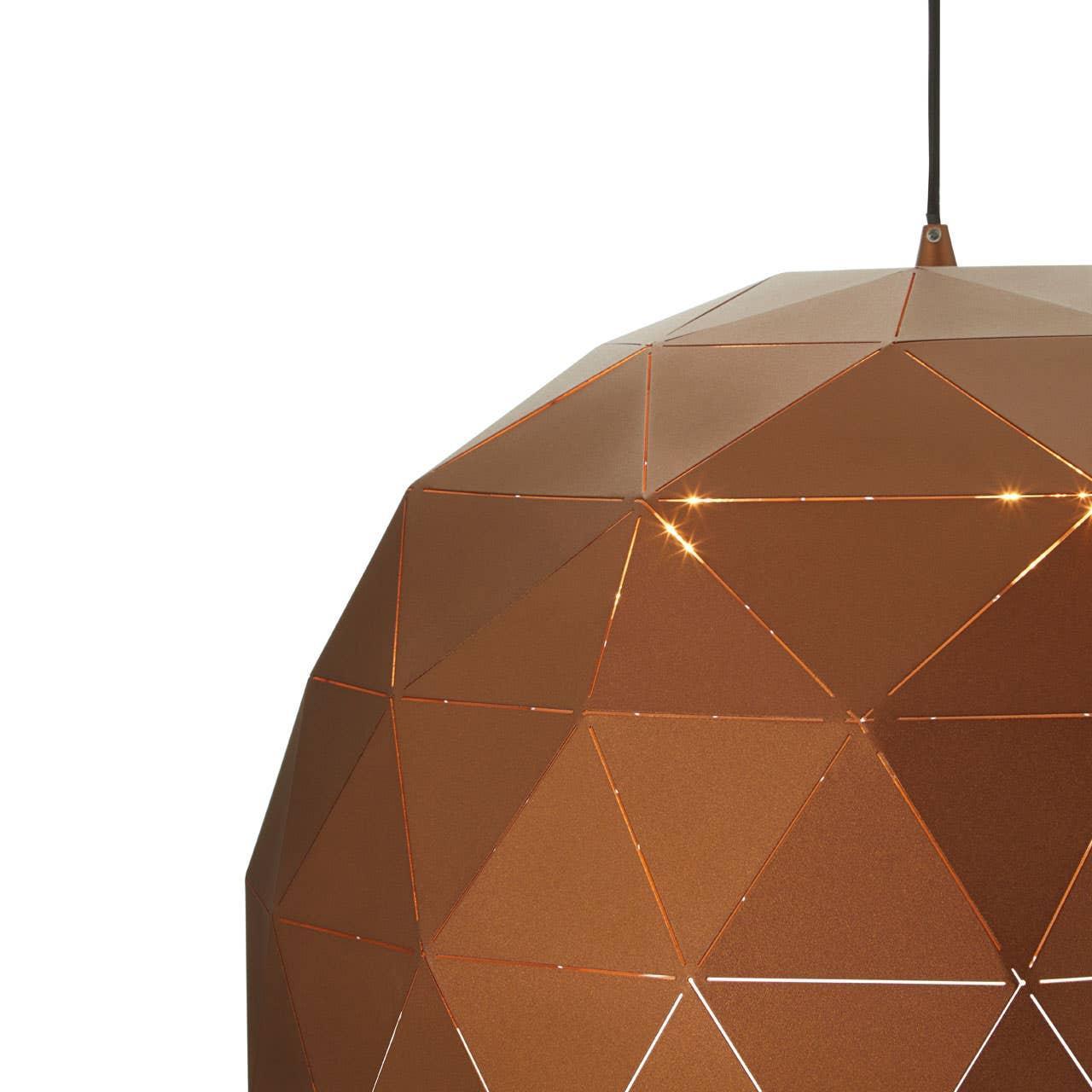 Copper geometric pendant light with faceted metal shade and glowing cutout details