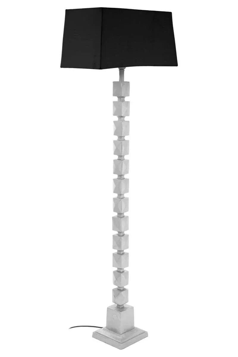 Modern floor lamp with geometric silver base and black rectangular shade