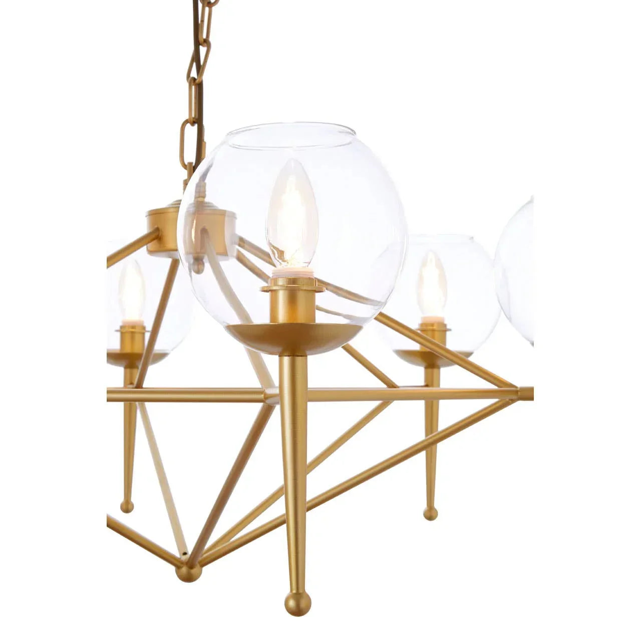 Modern gold chandelier with clear glass globes and candle-style bulbs