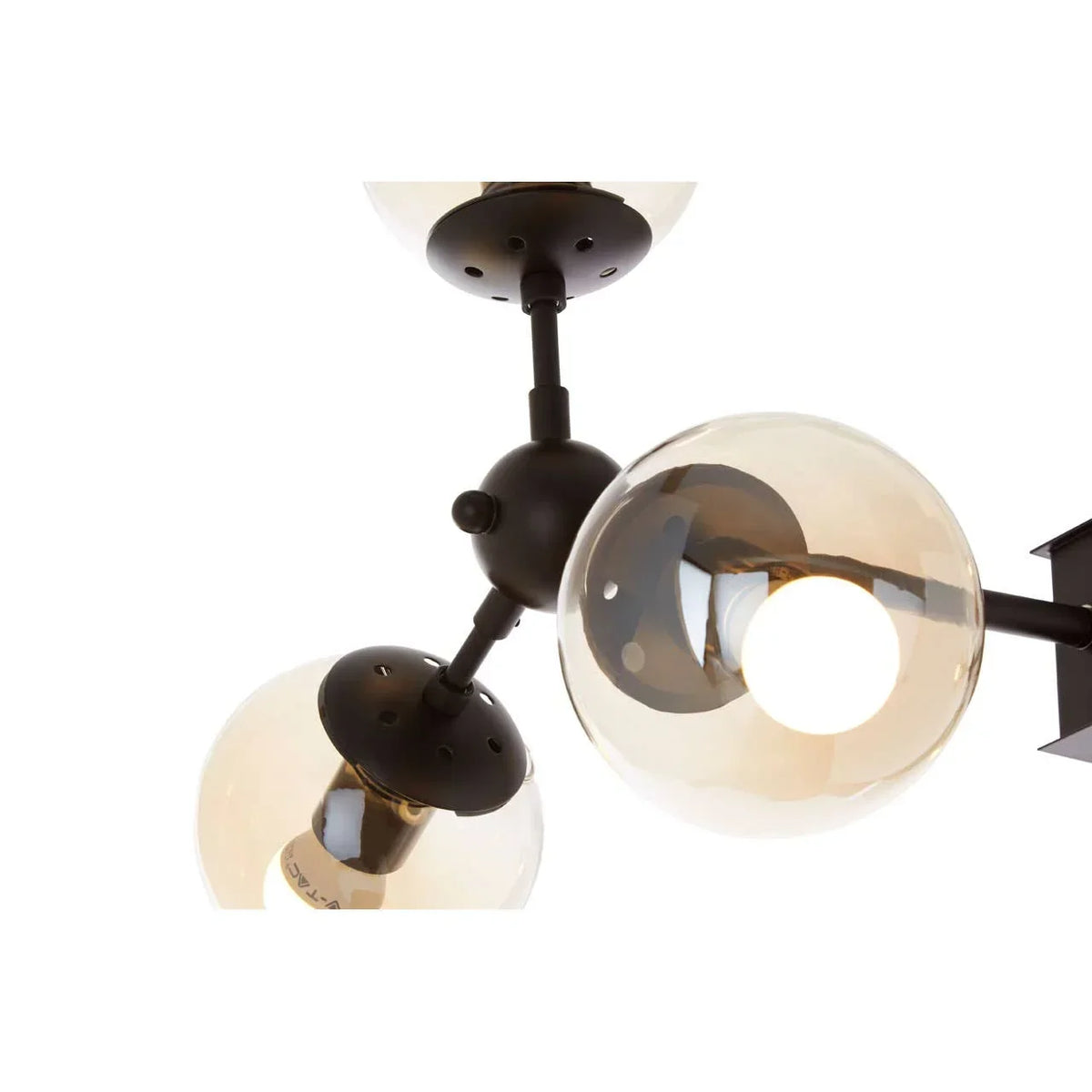 Modern ceiling light with black frame and three glass globe shades, close-up view