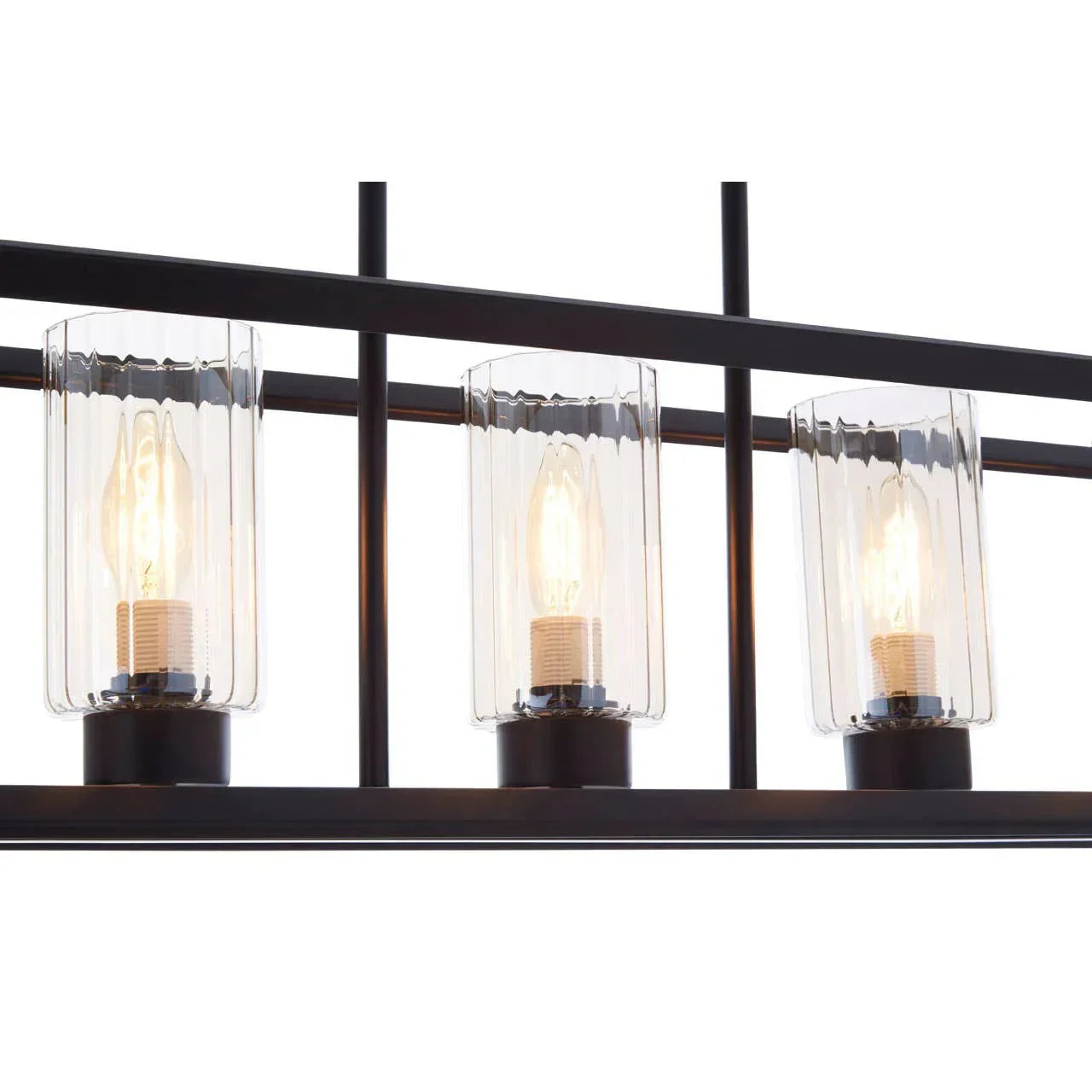 Black metal pendant light with three clear glass shades and exposed bulbs