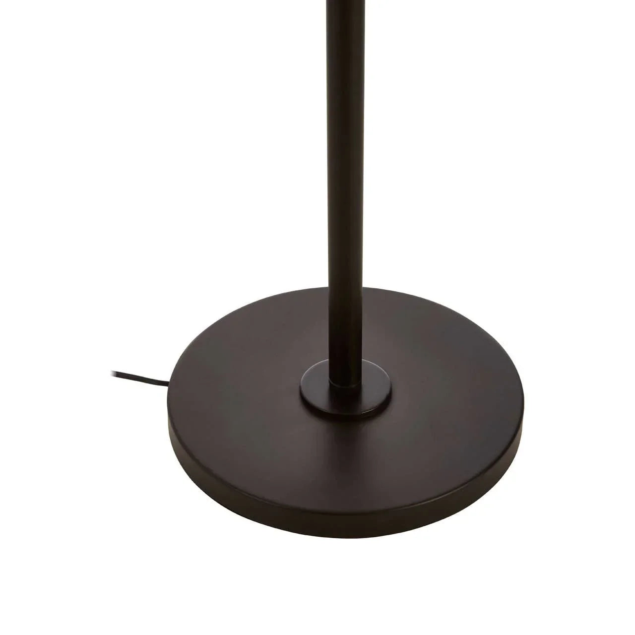Black metal floor lamp base with circular shape and visible power cord
