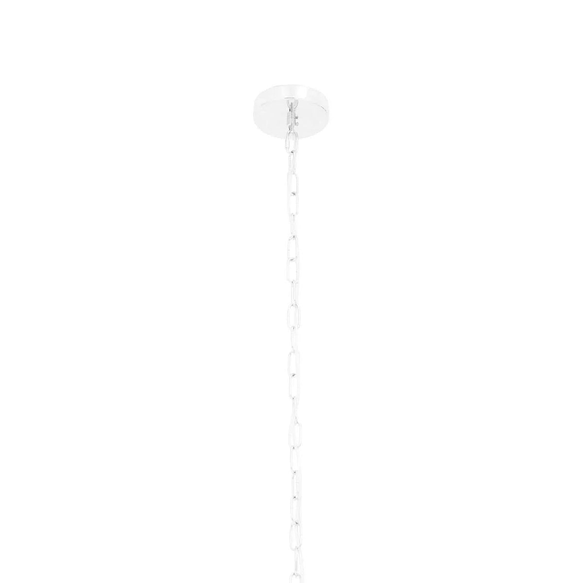 Close-up of chrome ceiling rose and chain for a pendant light fitting