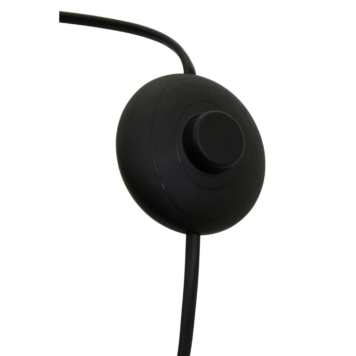 Close-up of black lamp foot switch with attached cable
