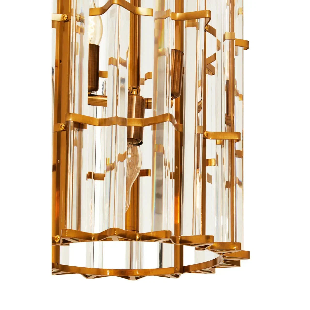 Gold and glass pendant light fixture with vertical rods and exposed bulb detail