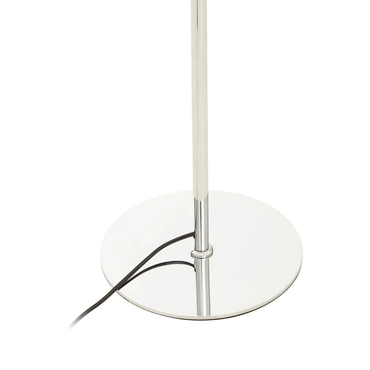 Chrome floor lamp base with round metal stand and black power cord on white background