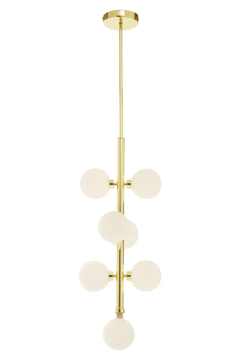 Gold pendant light fixture with six frosted glass globe shades in vertical arrangement