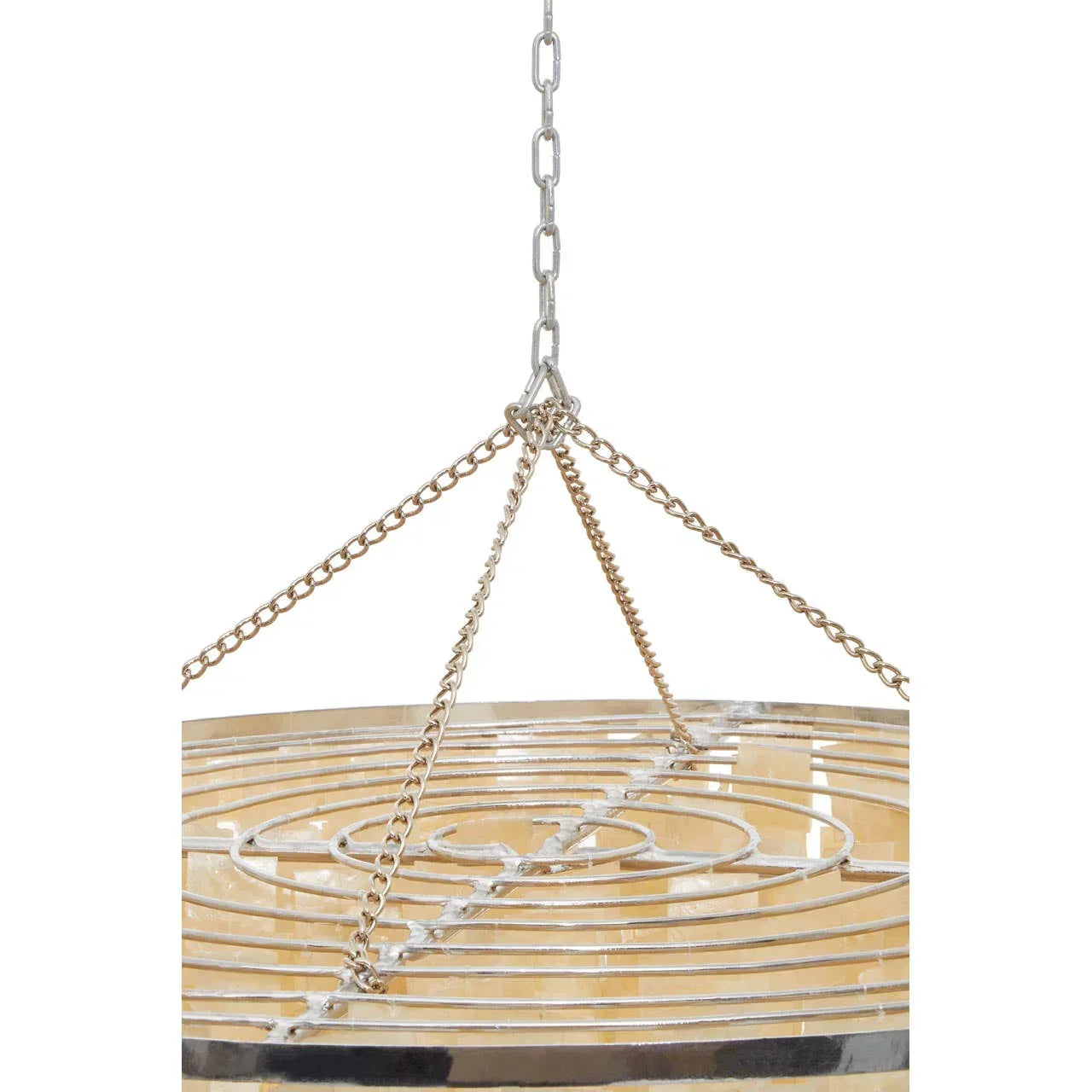Modern chandelier with metal chains and circular patterned frame in close-up