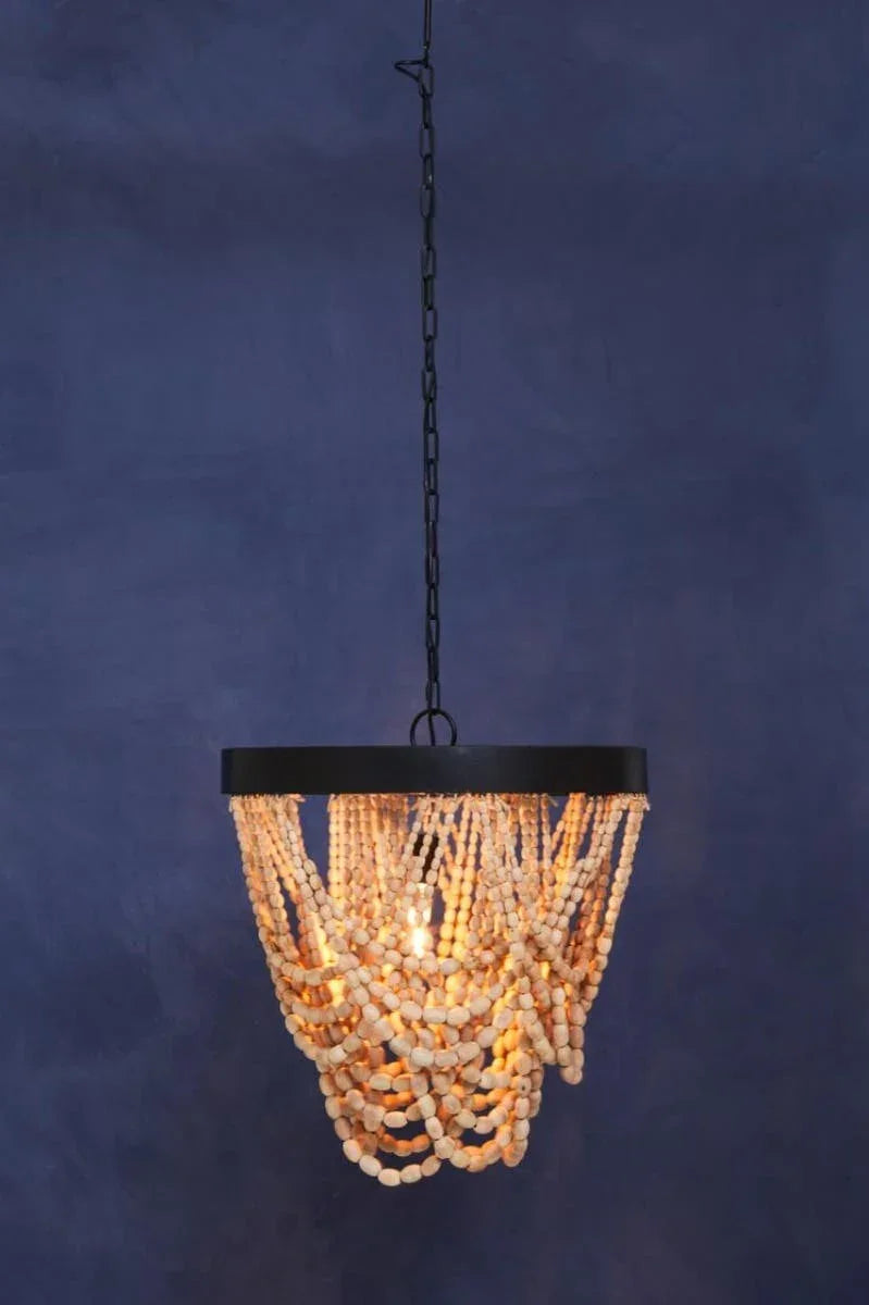 Wood bead chandelier with black metal frame and hanging chain against blue wall