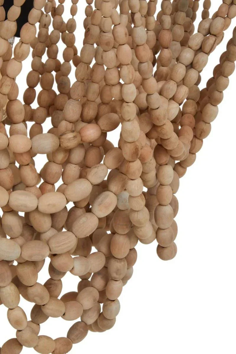 Close-up view of natural wood bead chandelier strands with oval shapes and light finish