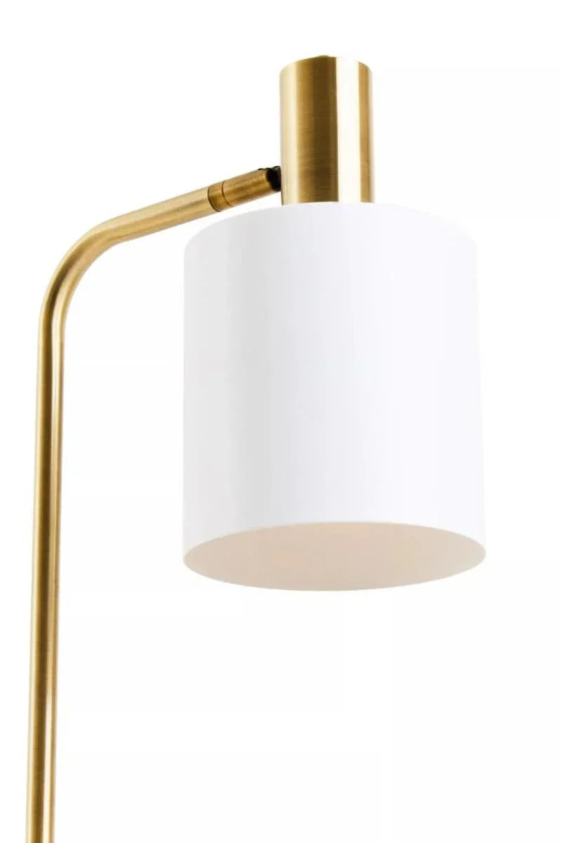 Brass floor lamp with white cylindrical shade, close-up on lamp head and arm