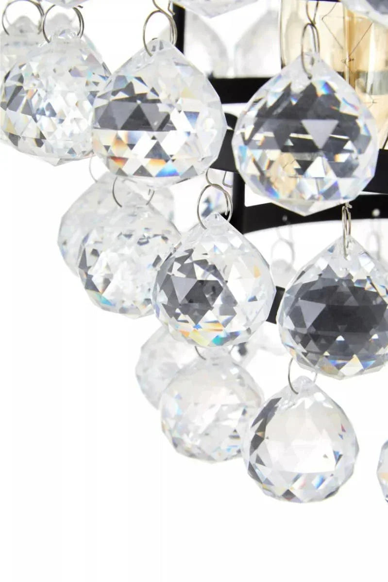Close-up of crystal chandelier drops hanging from metal frame