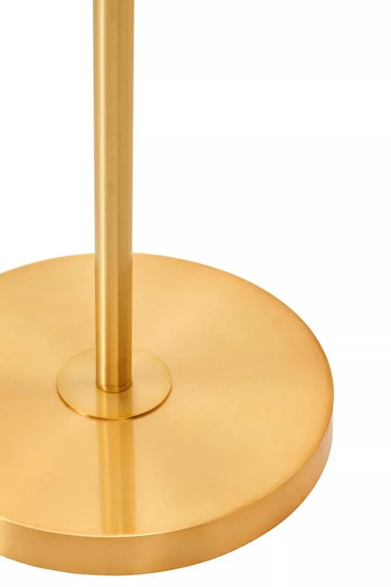 Round gold metal lamp base with a slim stand, close-up view on white background