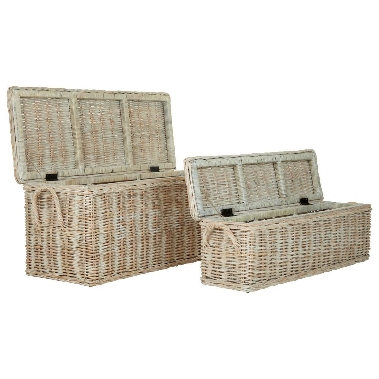 Set of two wicker storage trunks with hinged lids and rope handles, shown open