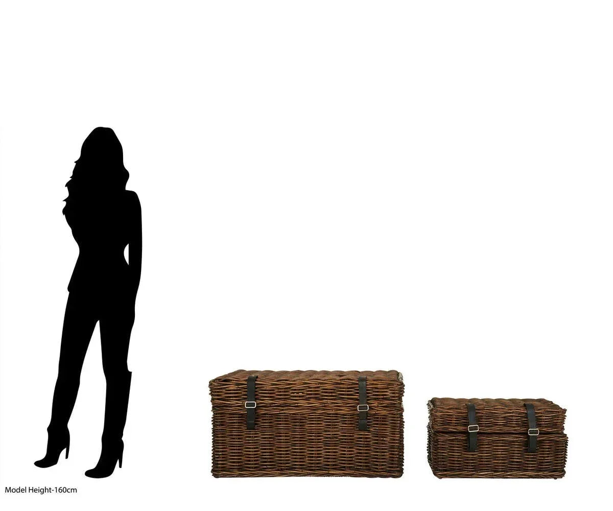 Set of two brown wicker storage baskets with leather straps shown beside a height guide silhouette