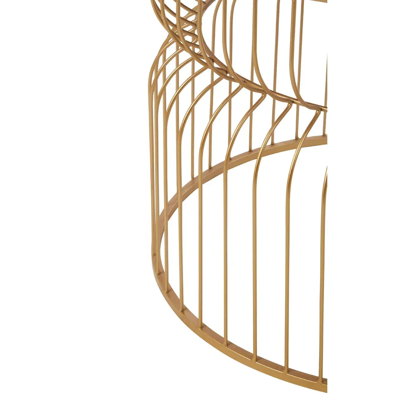 Closeup of gold metal coffee table base with circular openwork design