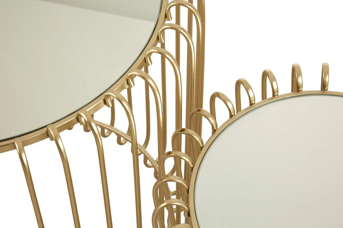 Gold metal side tables with mirrored tops and curved wire frame detail