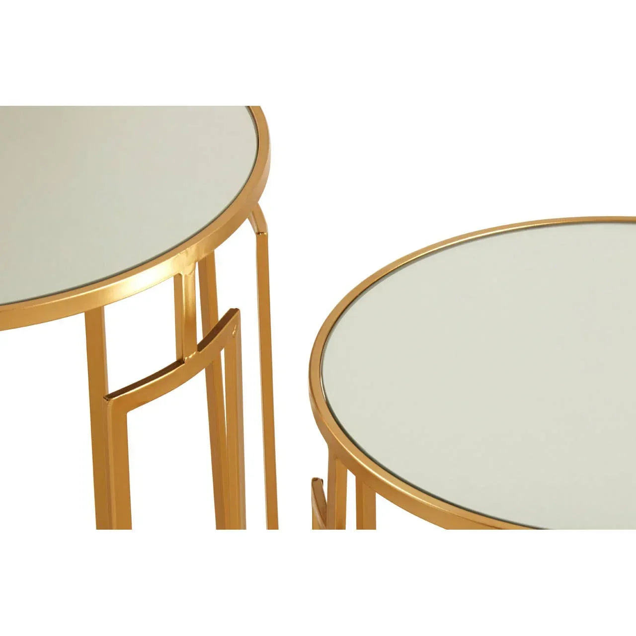 Round gold metal nesting tables with mirrored tops, close up of frame and surface