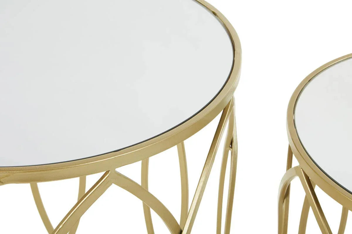 Round glass top coffee tables with gold metal frames and geometric base design